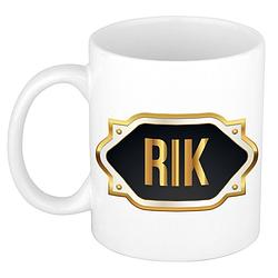 Foto van Naam cadeau mok / beker rik met gouden embleem 300 ml - naam mokken