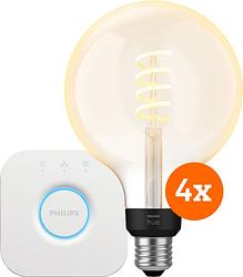 Foto van Philips hue filament white ambiance globe xl 4-pack + bridge