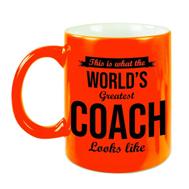 Foto van Worlds greatest coach cadeau koffiemok/theebeker neon oranje 330 ml - feest mokken