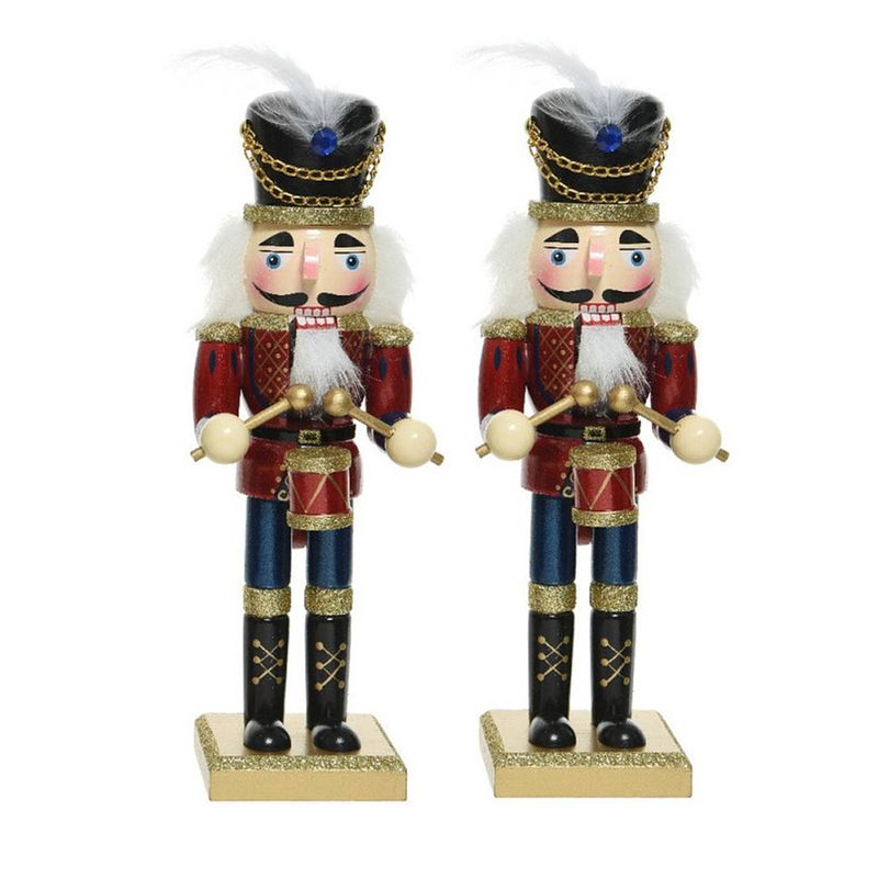 Foto van 2x stuks kerstbeeldjes houten notenkraker poppetjes/soldaten 25 cm kerstbeeldjes - kerstbeeldjes