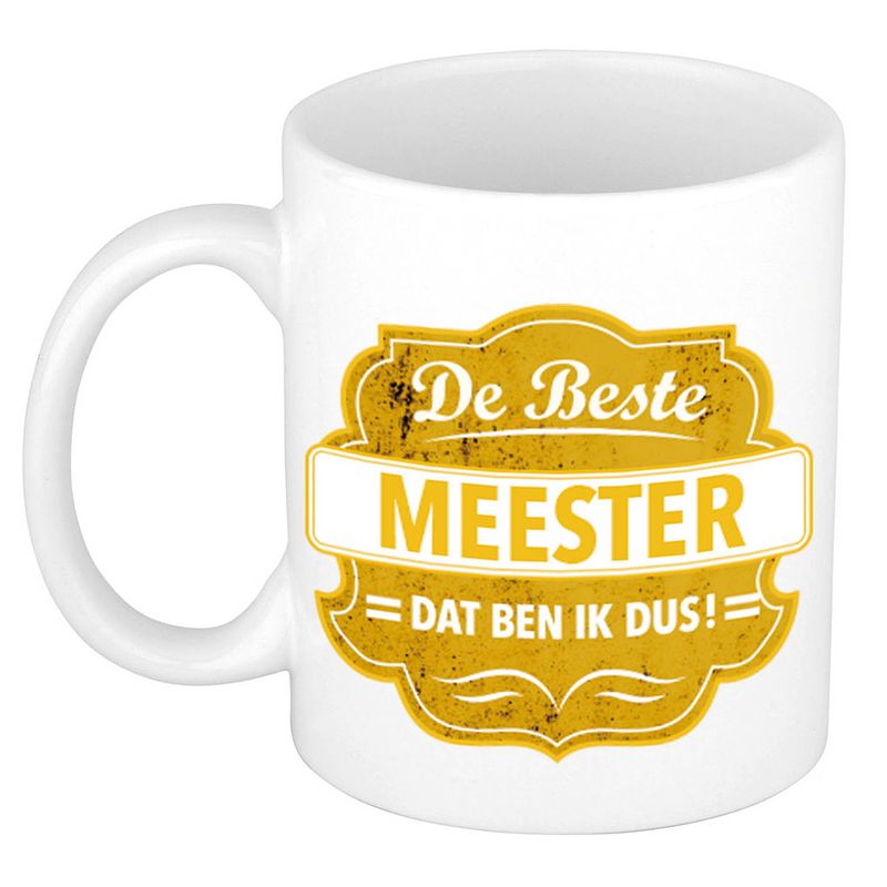 Foto van De beste meester cadeau koffiemok / theebeker geel embleem 300 ml - feest mokken