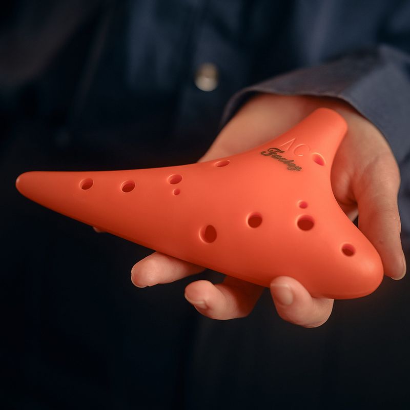 Foto van Fazley funtune ocarina 2aac12or orange alt ocarina in c majeur met 12 vingergaten