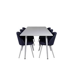 Foto van Polar180x90whwh eethoek eetkamertafel wit en 6 velvet eetkamerstal blauw.