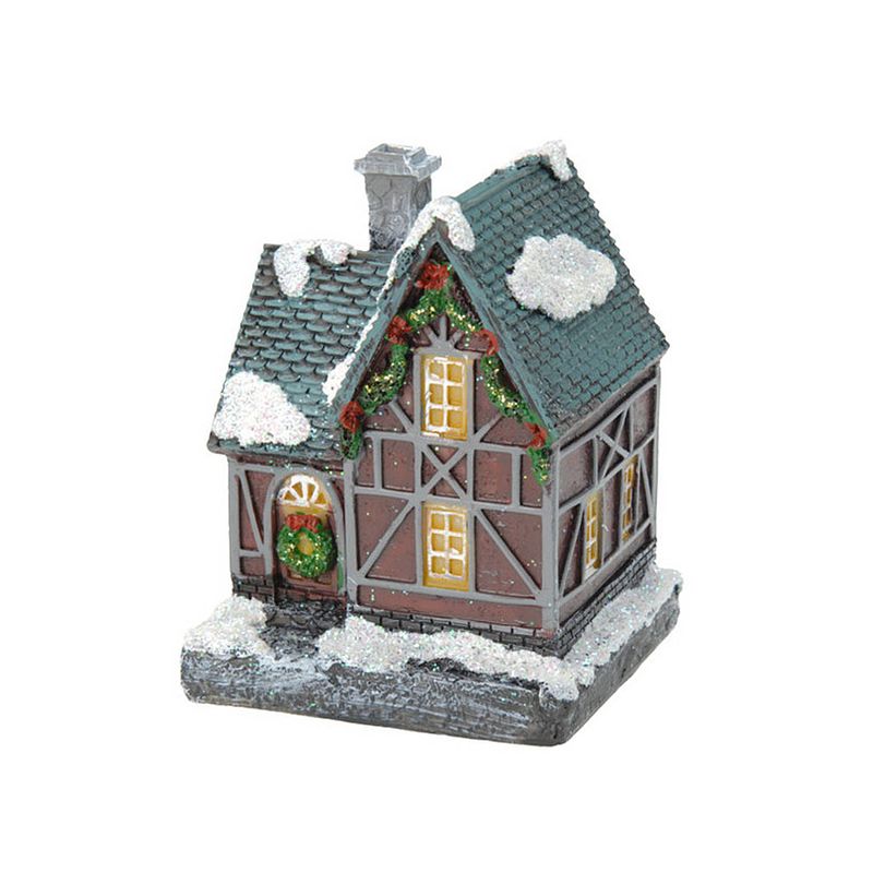 Foto van 1x verlichte color changing kerstdorp huisjes/kersthuisjes 13 cm - kerstdorpen