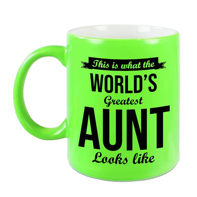 Foto van Worlds greatest aunt / tante cadeau koffiemok / theebeker neon groen 330 ml - feest mokken