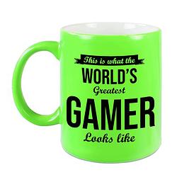 Foto van Worlds greatest gamer cadeau koffiemok / theebeker neon groen 330 ml - feest mokken