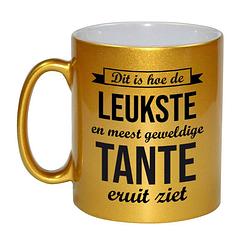 Foto van Gouden leukste en meest geweldige tante cadeau koffiemok / theebeker 330 ml - feest mokken