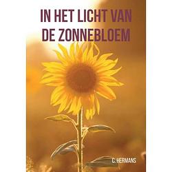 Foto van In het licht van de zonnebloem