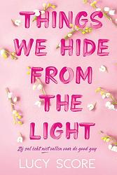 Foto van Things we hide from the light - lucy score - paperback (9789020553703)