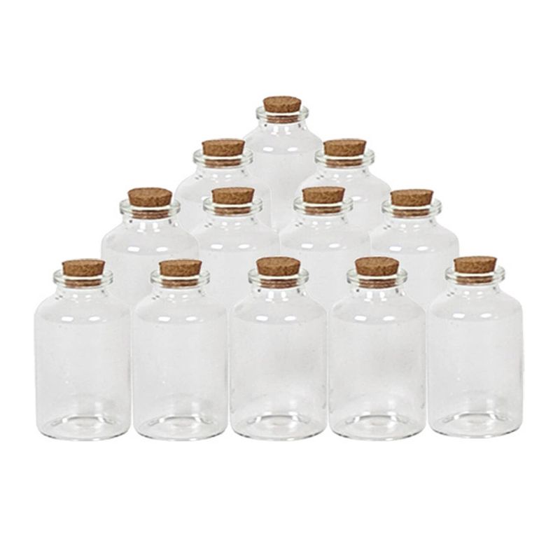 Foto van 12x kleine decoratieve glazen flesjes met kurken dop 30 ml - decoratieve flessen