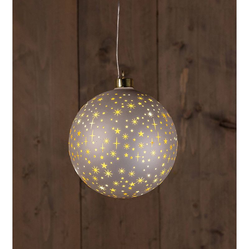 Foto van Anna'ss collection - b.o.t. ball glass matt champagne with stars 15 cm