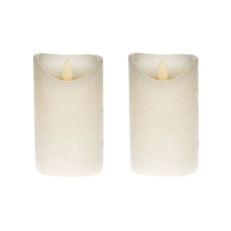 Foto van 2x led kaarsen/stompkaarsen ivoor met flakkerende vlam 12 cm - led kaarsen