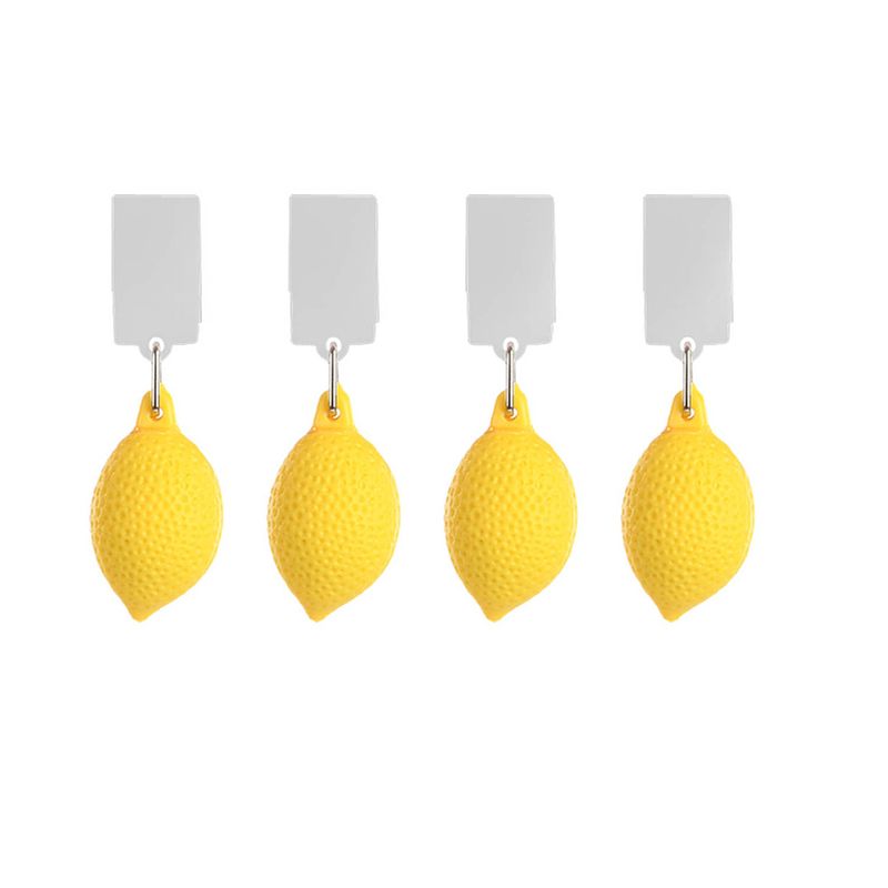Foto van Tafelkleedgewichten citroenen - 4x - geel - kunststof - voor tafelkleden en tafelzeilen - tafelkleedgewichten