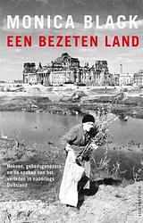 Foto van Een bezeten land - monica black - paperback (9789048870530)