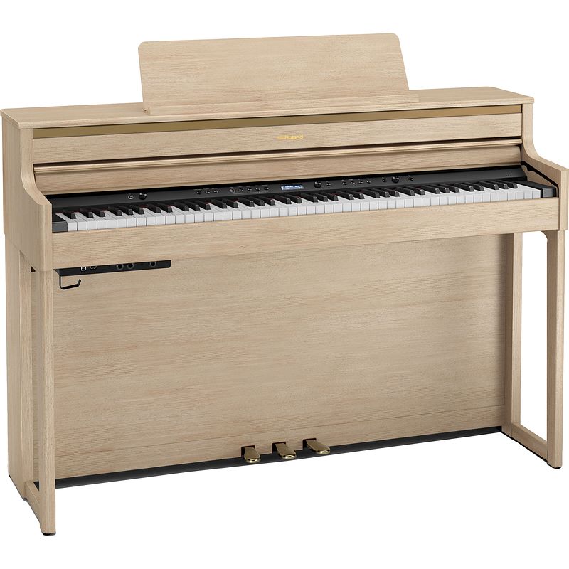 Foto van Roland hp704 digitale piano light oak