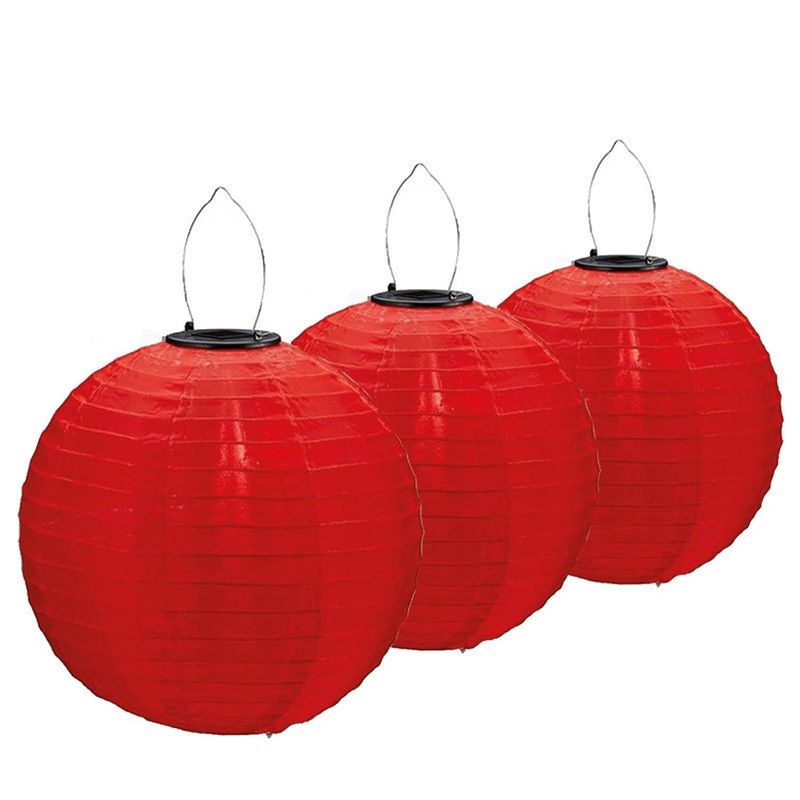 Foto van 3x stuks lampionnen op zonne energie rood 30 cm - lampionnen