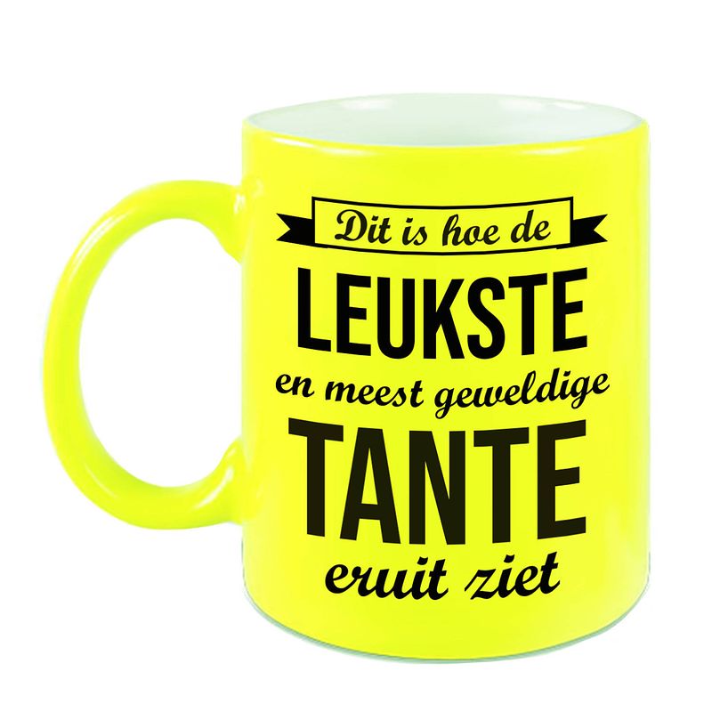 Foto van Leukste en meest geweldige tante cadeau koffiemok / theebeker neon geel 330 ml - feest mokken