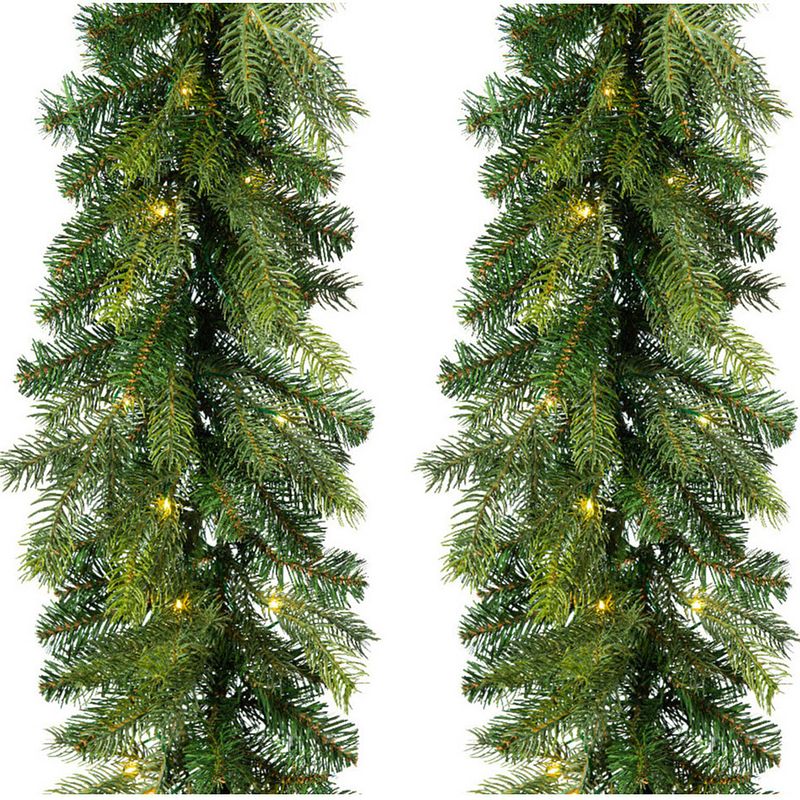 Foto van Set van 2x stuks kerst dennenslinger guirlandes groen met verlichting 20 x 270 cm twinkelend - guirlandes