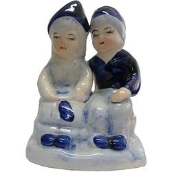 Foto van Delftsblauw aardewerk paartje zittend