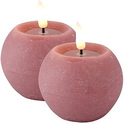 Foto van Magic flame led kaarsen/bolkaarsen - 2x st- rond - roze - d8 x h7,5 cm - led kaarsen
