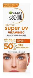 Foto van Garnier ambre solaire super uv - vitamine c* anti-pigmentvlekken fluid spf 50+