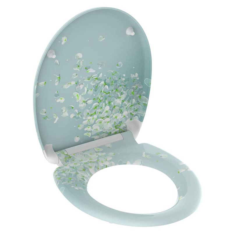 Foto van Schütte toiletbril met soft-close quick-release flower in the wind