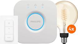 Foto van Philips hue filament white globe xl 4-pack startpakket