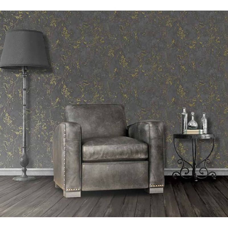 Foto van Dutch wallcoverings behang marble zwart en goud