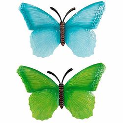 Foto van Set van 2x stuks tuindecoratie muur/wand/schutting vlinders van metaal in blauw en groen tinten 40 x 25 cm