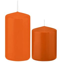 Foto van Stompkaarsen set van 4x stuks oranje 8 en 12 cm - stompkaarsen