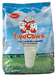 Foto van Two cows volle melkpoeder