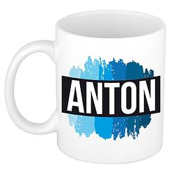 Foto van Naam cadeau mok / beker anton met blauwe verfstrepen 300 ml - naam mokken