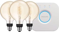 Foto van Philips hue filament white globe xl 3-pack + bridge