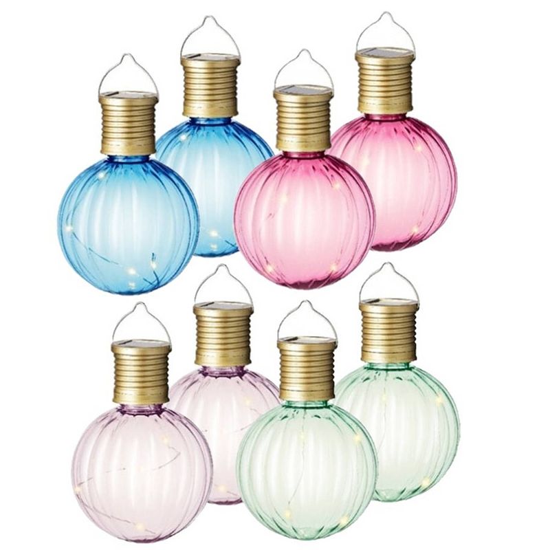 Foto van Set van 12x stuks buiten led lichtroze, groene, blauwe en roze lampion solar verlichting 11 cm - lampionnen