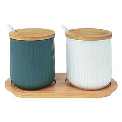 Foto van Krumble 2 keramieke potjes met lepels op ronde houten plankje - groen + wit