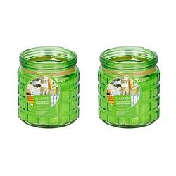 Foto van 2x stuks citronella kaarsen tegen insecten in glazen pot 12 cm groen - geurkaarsen