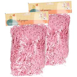 Foto van Set van 2x decoratie paasgras vulmateriaal - crepe papier - roze - 100 gram - feestdecoratievoorwerp